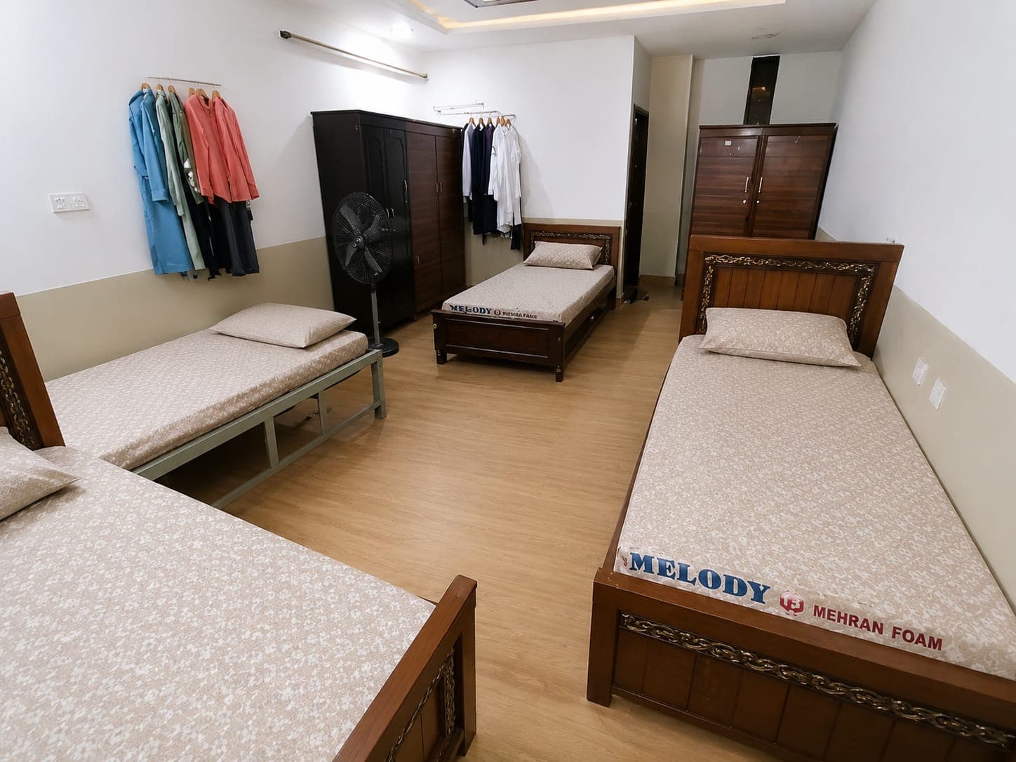 comfortable living in our Four Seater VIP Luxury Room, designed for students and professionals. The room features comfortable beds, spacious cupboards, and a clean environment to ensure a pleasant and productive stay
